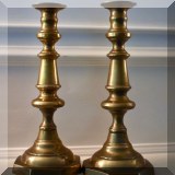 D043. Brass candlesticks. 10”h - $28 
